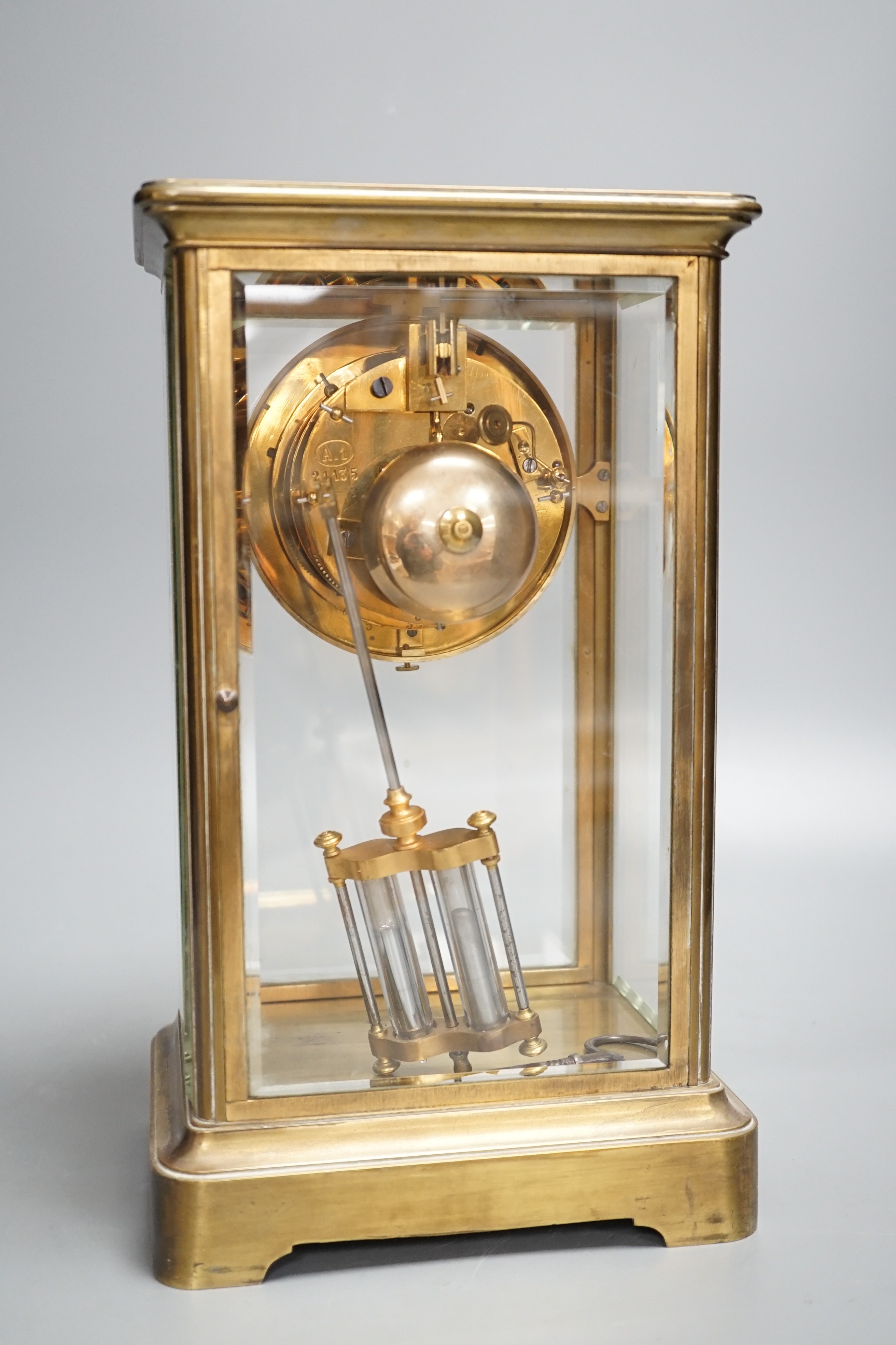 A late 19th century French four glass mantel clock with S.Marti movement, mercury pendulum & key. 30cm